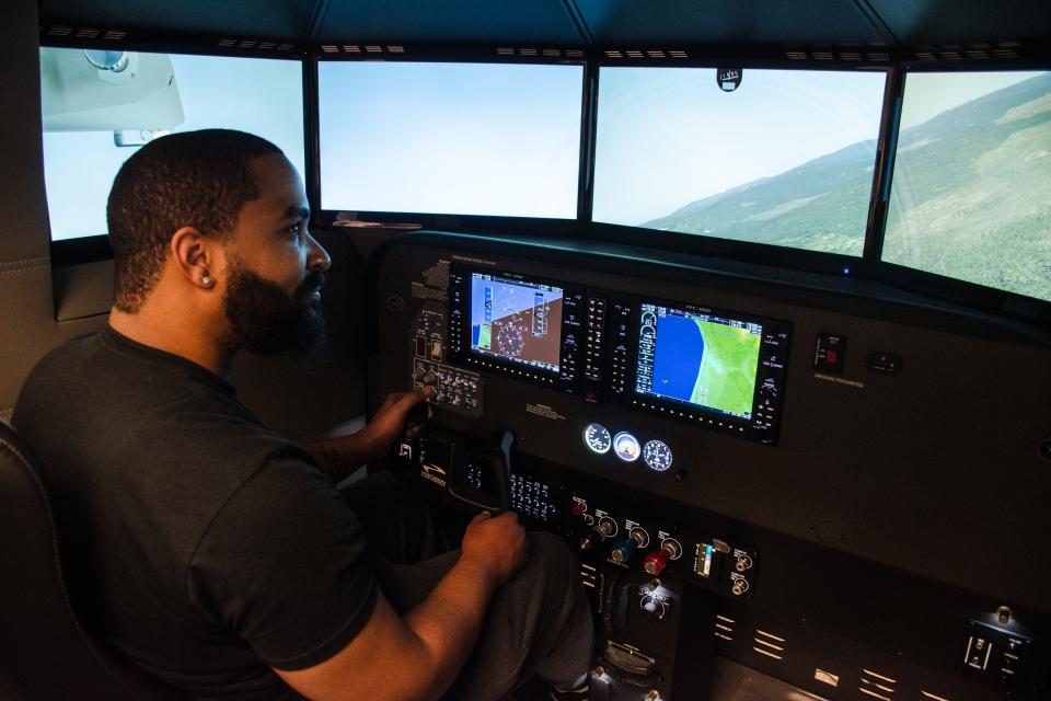 image of person in flight simulator
